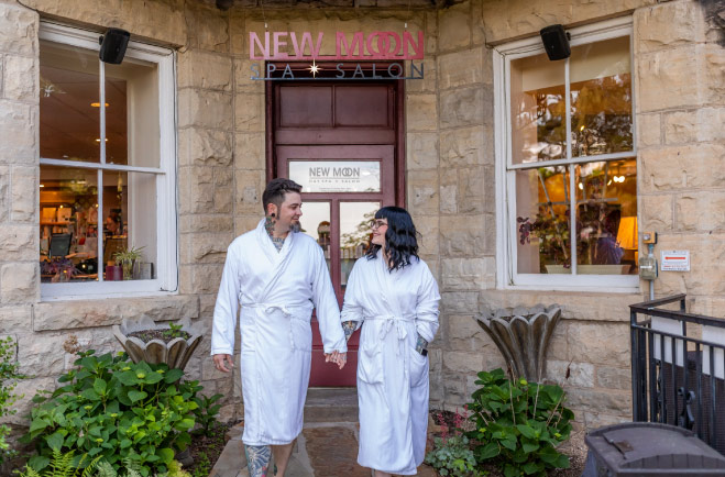 Couple in robes at the New Moon Spa
